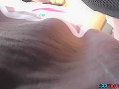 Upskirting filmed skinny ass of a brunette gal