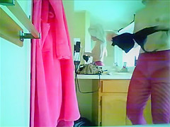 Wife dresses up after a shower