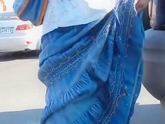 Wife flashing bush in the parking lot and store