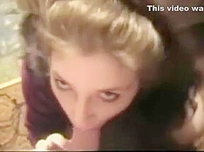 Wife on her knees sucking his cock after lost bet again