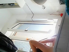 Wife spied in bathroom seated in the bathtub