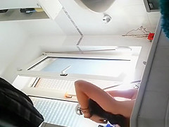 Wife spied in bathroom seated in the bathtub