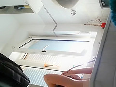 Wife spied in bathroom seated in the bathtub