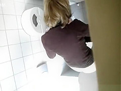 Woman caught in public toilet peeing
