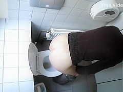 Woman caught in public toilet peeing