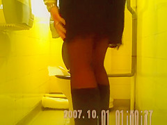 Woman lifts her skirt to take a piss