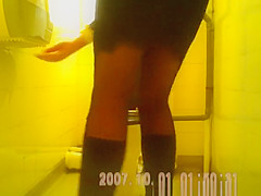 Woman lifts her skirt to take a piss