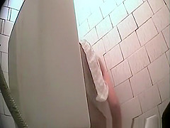 Woman with nice butt and shaved cunt spied pissing