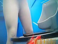 Women pissing in toilet