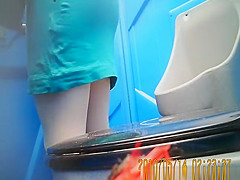 Women pissing in toilet