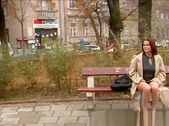 red head peeing in the park