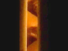 through window - mature couple masturbates each other