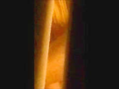 through window - mature couple masturbates each other