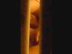 through window - mature couple masturbates each other